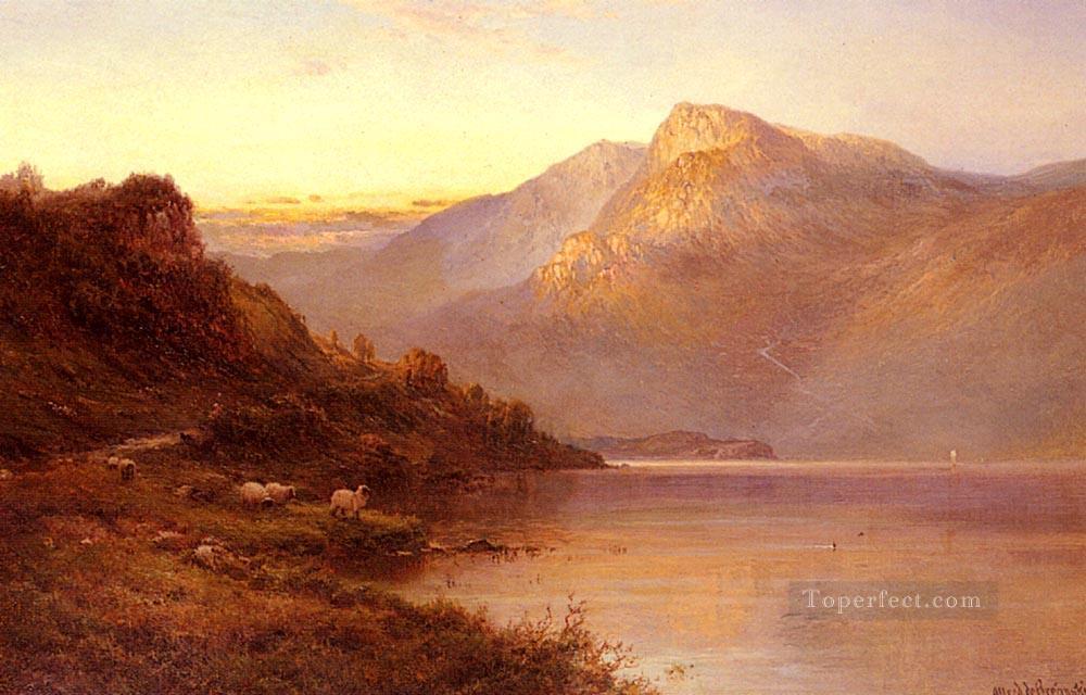 Puesta de sol en el paisaje del lago Alfred de Breanski Snr Pintura al óleo